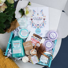 Load image into Gallery viewer, Gifting box with bath bombs, soap, and &#39;Hygge&#39; themed items on a white surface.