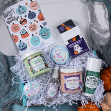 Load image into Gallery viewer, Halloween-themed beauty products including body lotion, cream, and soap in a decorative box.