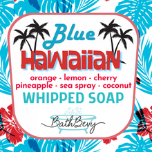 Load image into Gallery viewer, A square product label for Bath Bevy Blue Hawaiian Whipped Soap, featuring a white central card with red and blue text, black palm tree silhouettes, and a tropical leaf pattern in blue, red, and white around the border.