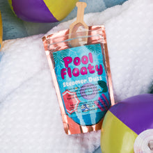 Load image into Gallery viewer, A foil pouch labeled 'Pool Floaty Steamer Dust' with a wooden scoop resting on top, placed on a white textured towel with beach ball props partially visible.