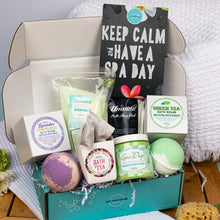 Load image into Gallery viewer, Spa day gift set with bath products and a card in a box.