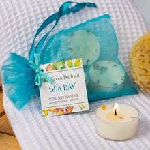 Load image into Gallery viewer, Spa-themed product set with candles, soap, and a tag on a textured surface.