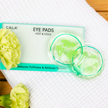 Load image into Gallery viewer, Cala eye pads on a white towel with green flowers