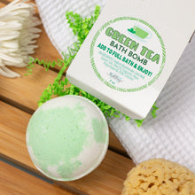 Load image into Gallery viewer, Green tea bath bomb with packaging on a wooden surface