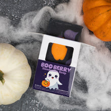 Load image into Gallery viewer, A Halloween-themed handcrafted soap bar in a white and purple window box, styled with fake cobwebs, a white pumpkin, and an orange pumpkin on a dark gray surface.