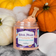 Load image into Gallery viewer, A jar of 'Witch, Please' whipped soap scrub by Belding Apothecary, styled with orange and white pumpkins, white faux cobwebbing, and a wooden scoop on a dark gray background.