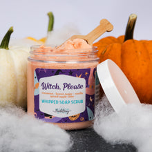 Load image into Gallery viewer, A jar of whipped soap scrub labeled 'Witch, Please' by Bad Bunny, styled with a wooden spoon, white lid, and Halloween props including pumpkins and faux cobwebs.