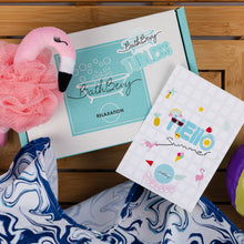 Load image into Gallery viewer, BathBevy product with a pink flamingo, bath towel, and 'Hello Summer' card on a wooden surface.