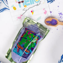 Load image into Gallery viewer, Colorful product packaging with a spoonful of purple powder on a white background