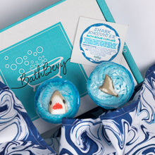 Load image into Gallery viewer, Two shark-themed bath bombs with a 'BathBerry' branded card in the background.