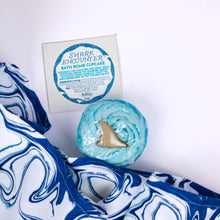 Load image into Gallery viewer, Shark-themed bath bomb with packaging on a white background