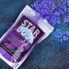 Load image into Gallery viewer, A stand-up pouch labeled 'STAR DUST STEAMER DUST' filled with purple powder, photographed on a dark starry blue background with loose purple powder scattered around it.