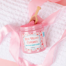 Load image into Gallery viewer, Jar of 'Red Velvet Cupcakes' whipped soap scrub with a wooden spoon on a white background