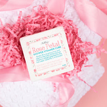 Load image into Gallery viewer, Rose Petal Shower Steamer Cube on pink shredded paper with a pink background