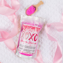 Load image into Gallery viewer, Shower steamers with pink bath salts and ribbons on a white background