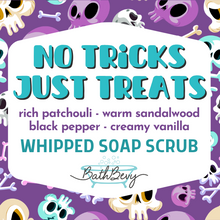 Load image into Gallery viewer, A colorful informational product graphic for BathBevy Whipped Soap Scrub. The design features a purple background with cartoon skulls and a white central panel containing the product name 'NO TRICKS JUST TREATS' and usage/ingredients text.